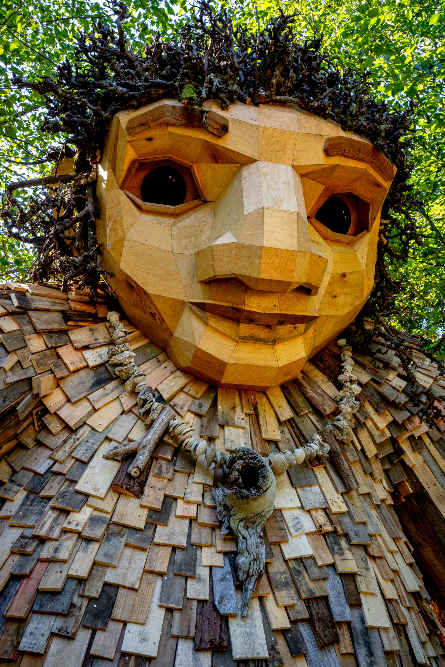Reclaimed wood troll art installation